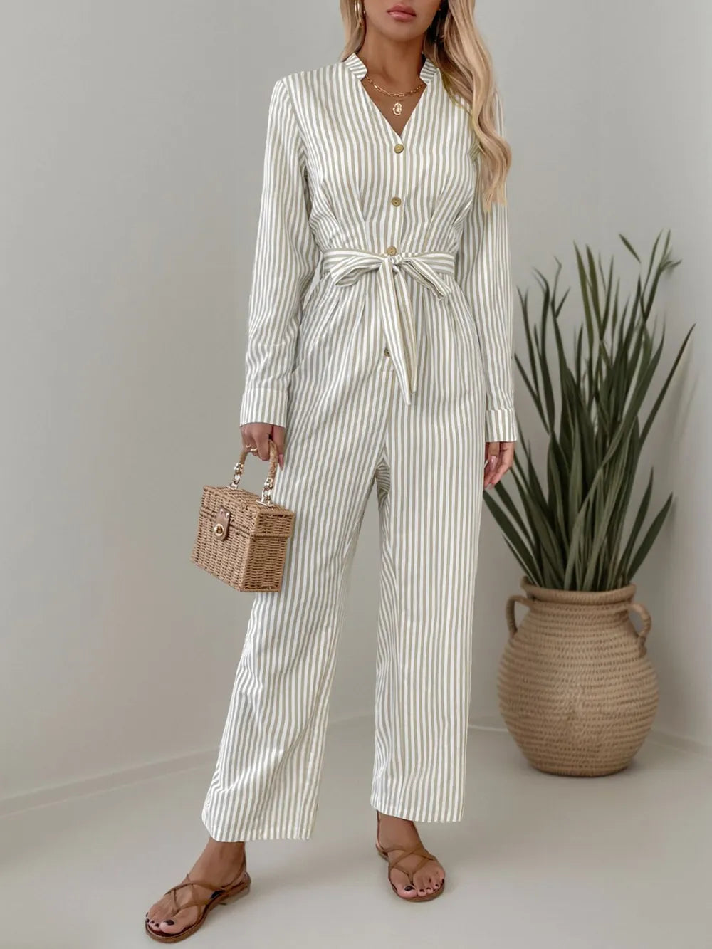 Striped Notched Long Sleeve Tie Waist Jumpsuit.