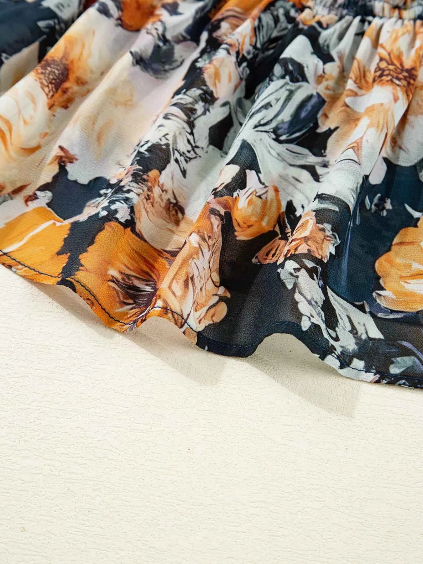 Floral Off Shoulder Bell Sleeve Smocked Peplum Top.