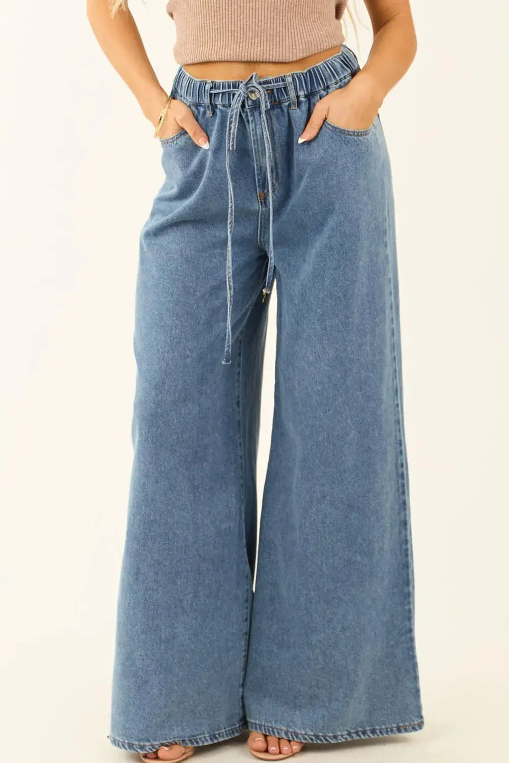Medium Wash Super Wide Leg Denim Pants.
