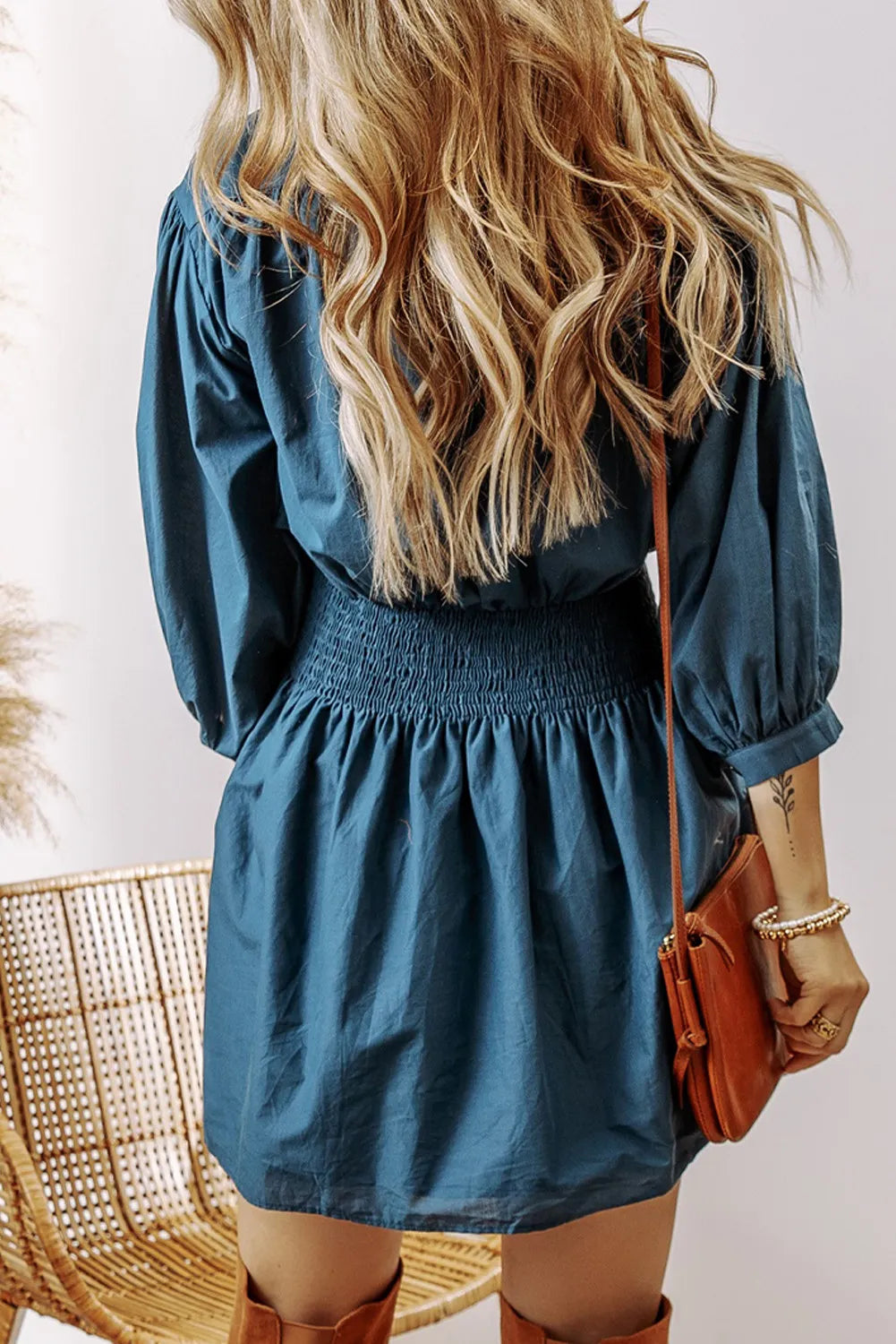 Smocked Half Button Three-Quarter Sleeve Mini Dress.