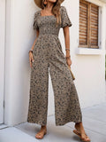 Perfee Smocked Printed Square Neck Puff Sleeve Jumpsuit.