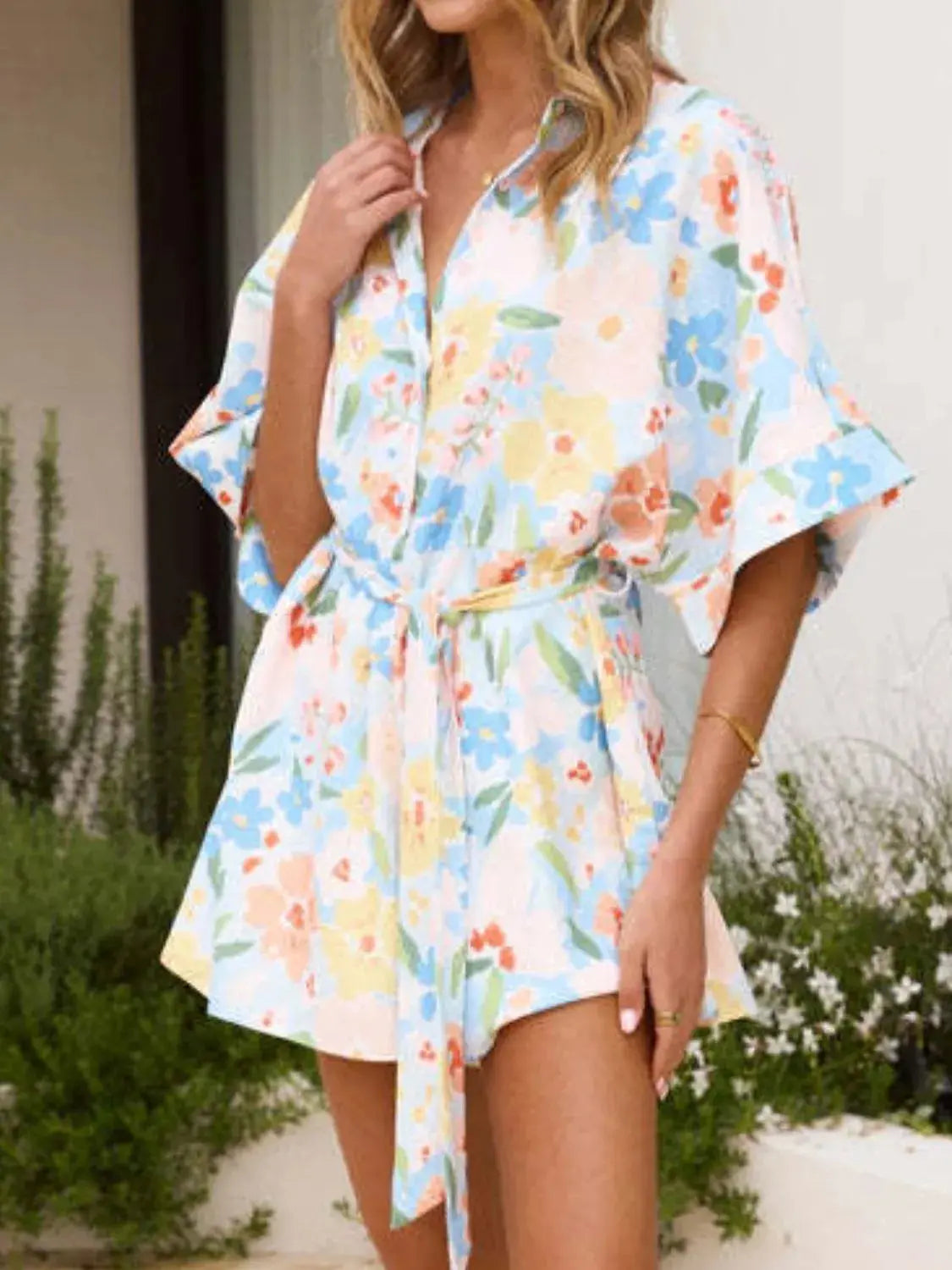 Printed Half Sleeve Tie Waist Romper.