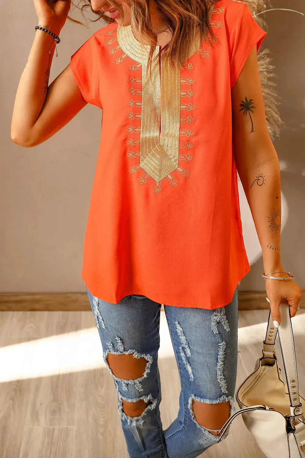 Embroidered Short Sleeve Blouse.