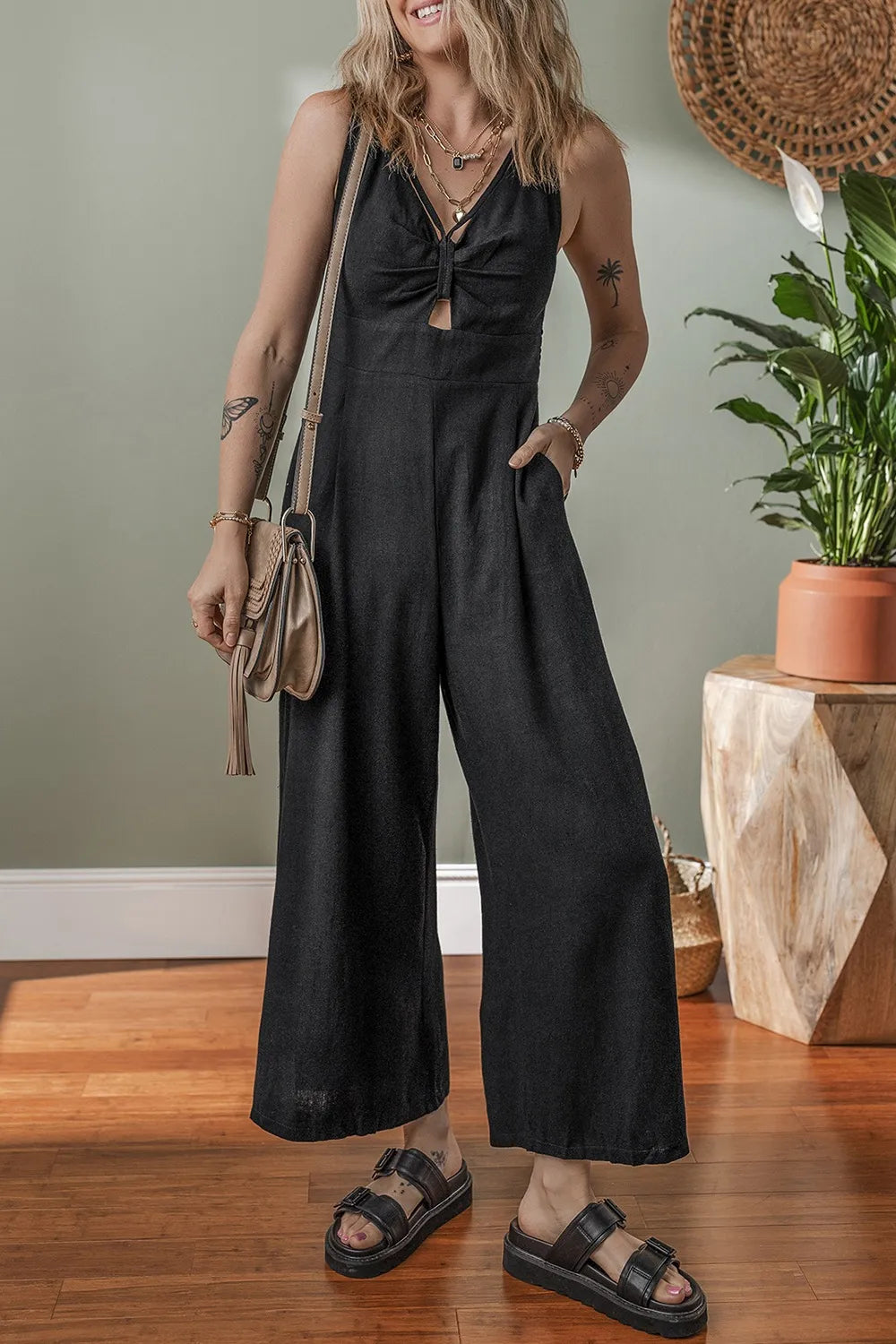 Front Cut Out Smocked Back Sleeveless Wide Leg Jumpsuit.