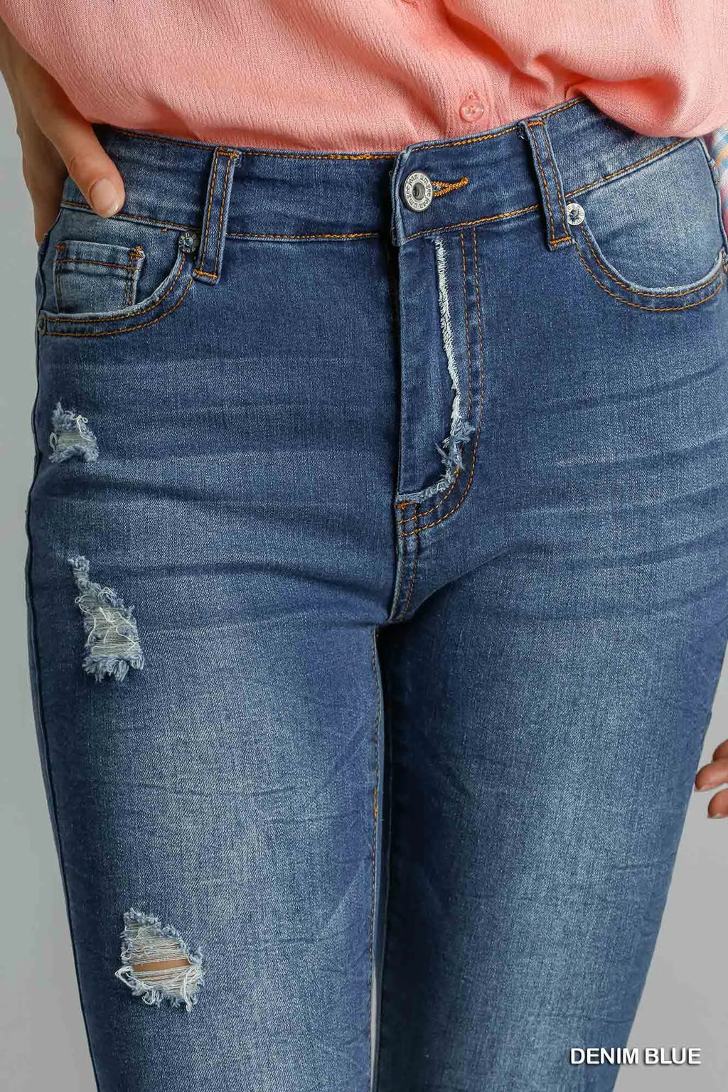 Umgee Distressed Skinny Jeans with Pockets.