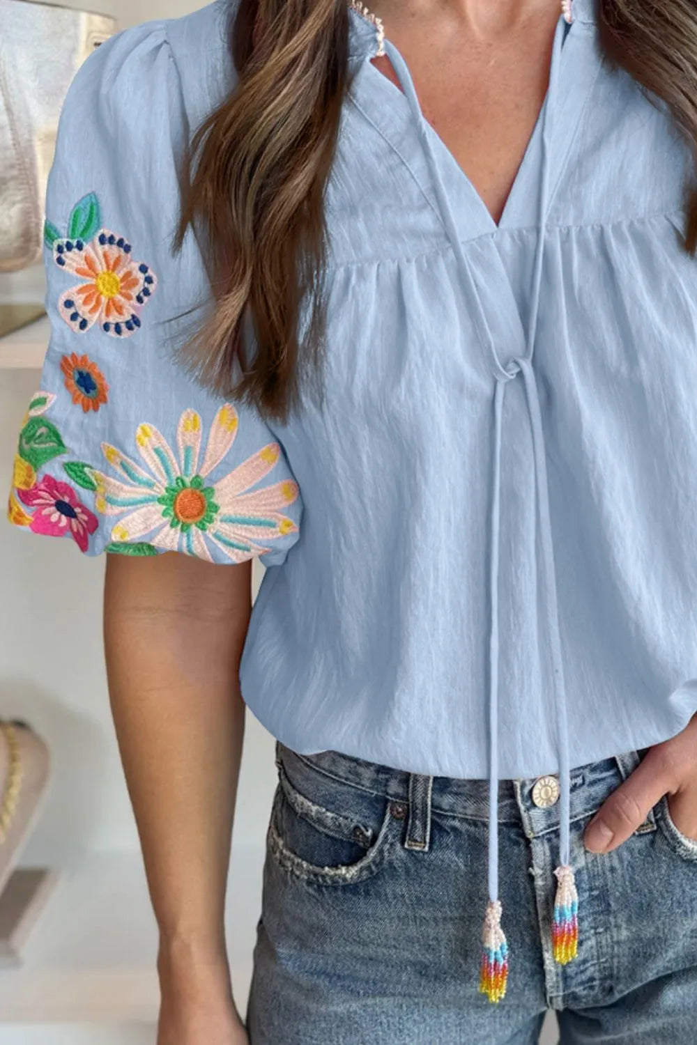 Embroidered Tie Neck Short Sleeve Blouse.