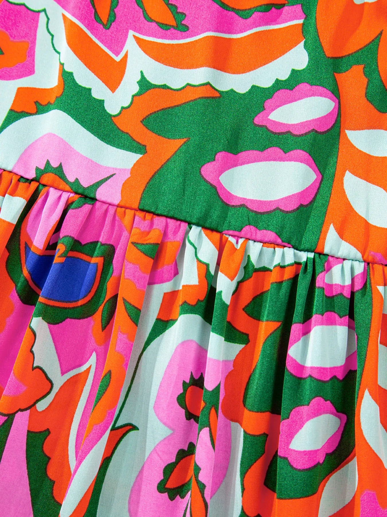 Tropical Print Short Sleeve Tie Neck Blouse.