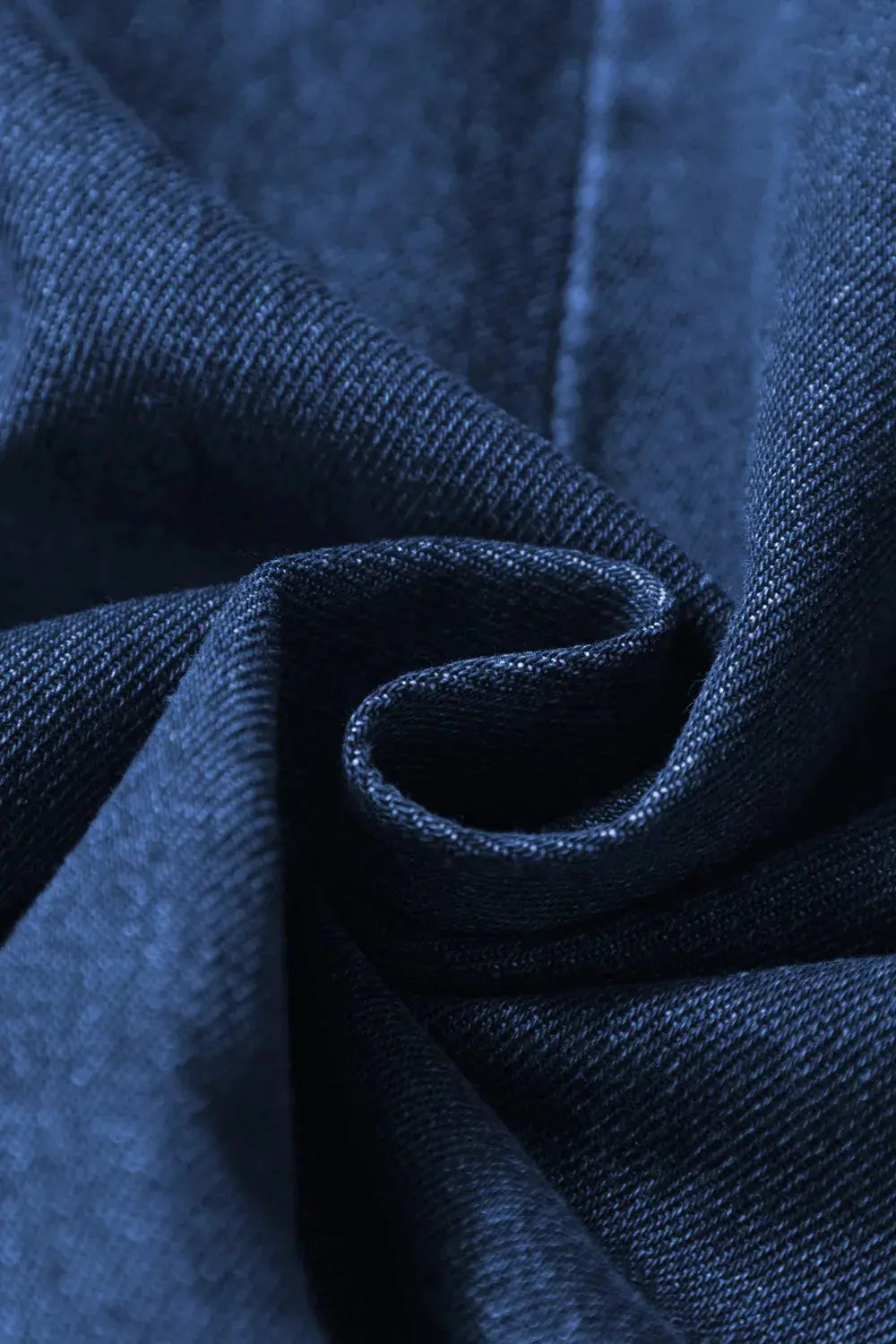 Denim Ruffled Zipped Front Belted Romper.