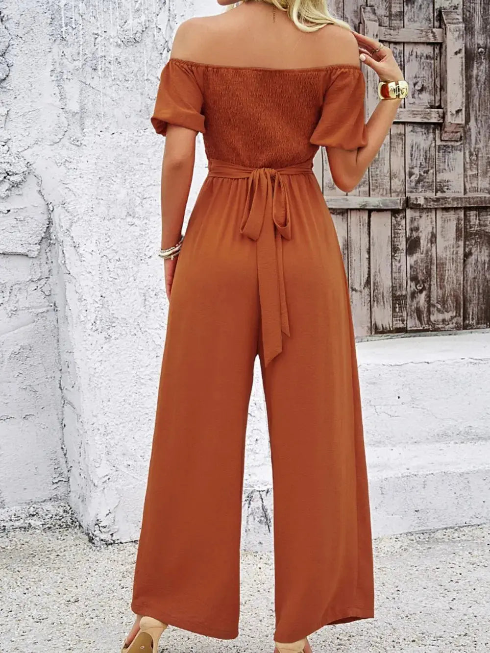 Devine Cutout Off Shoulder Wide Leg Jumpsuit.