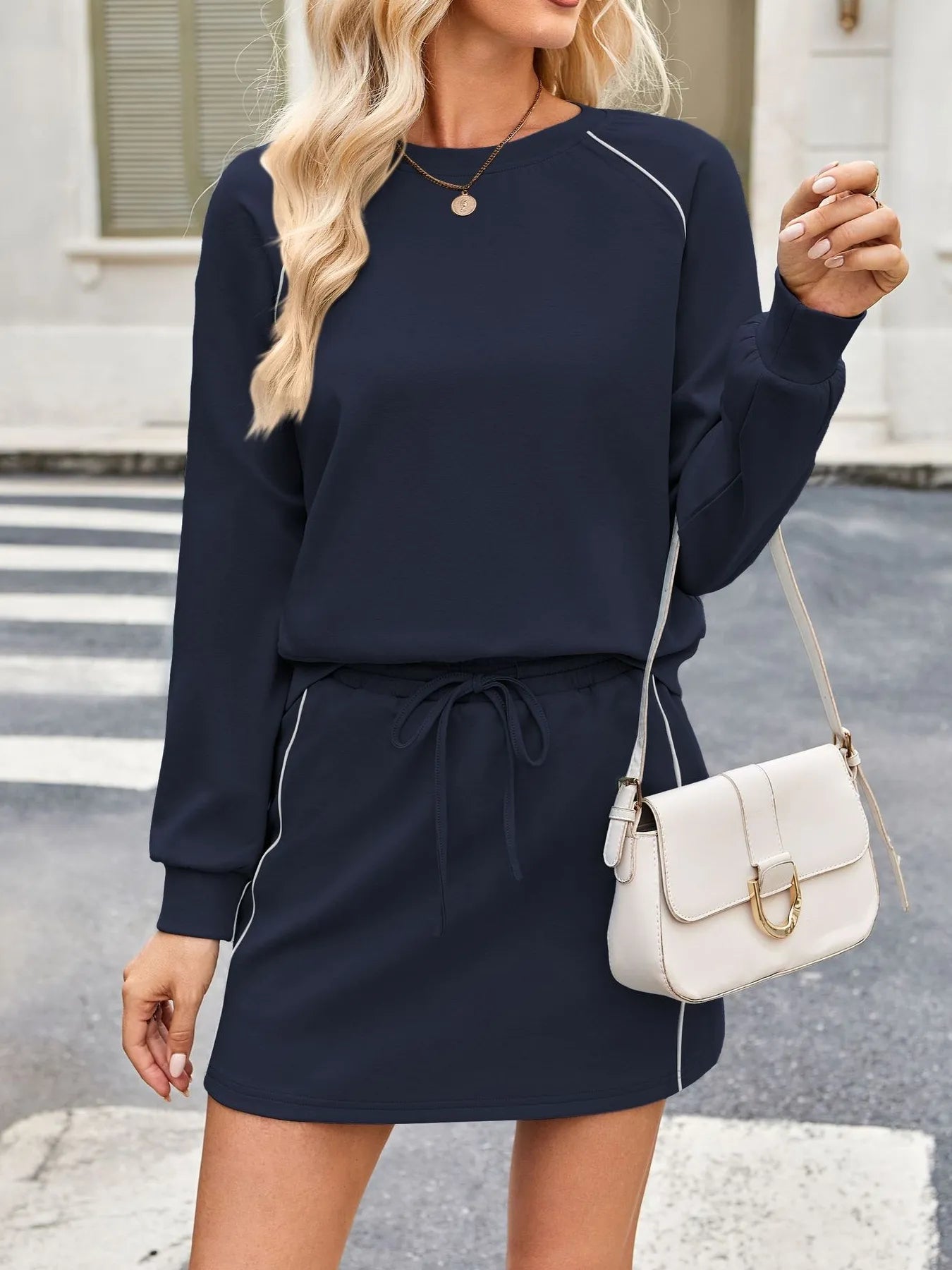 Round Neck Raglan Sleeve Top and Skort Set.