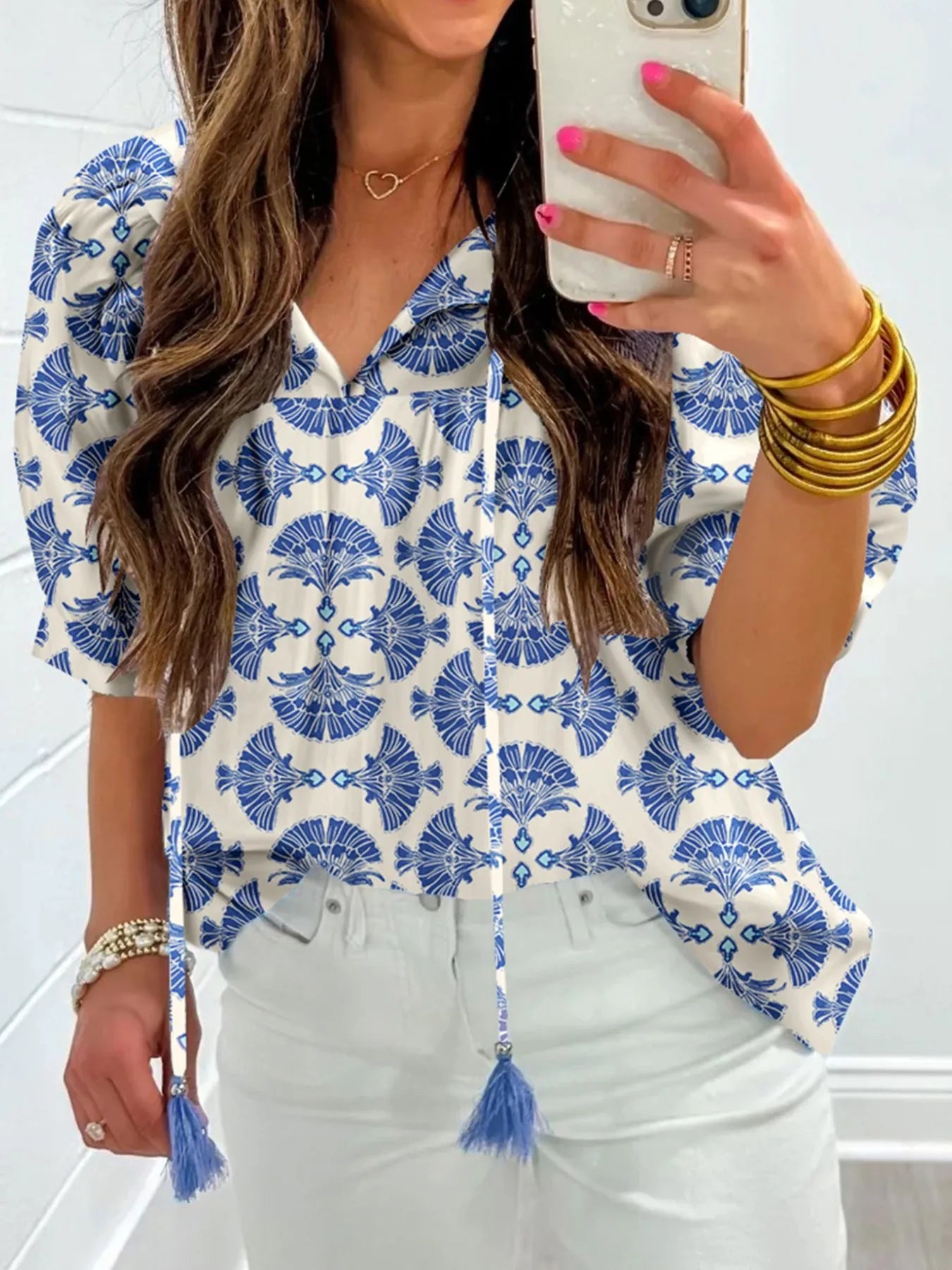 Printed Tassel Tie Neck Blouse.