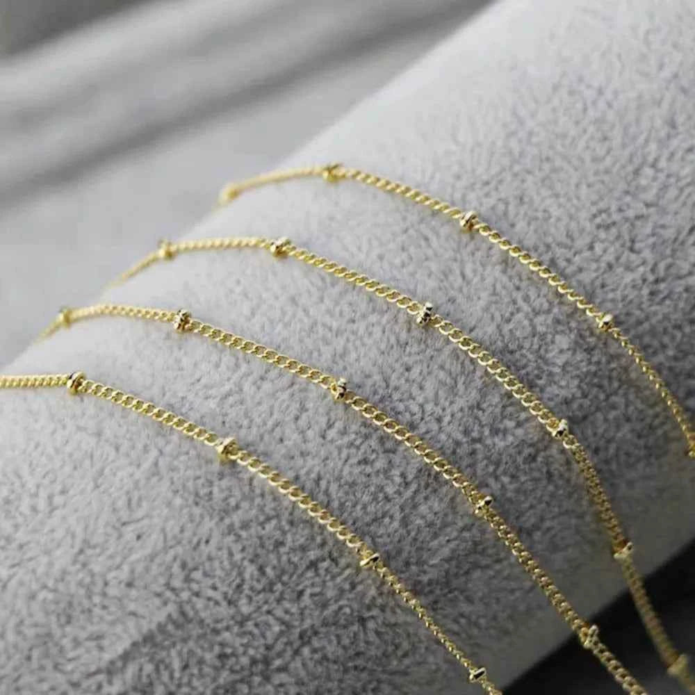 Gold-Plated Bubble Initial Necklace.