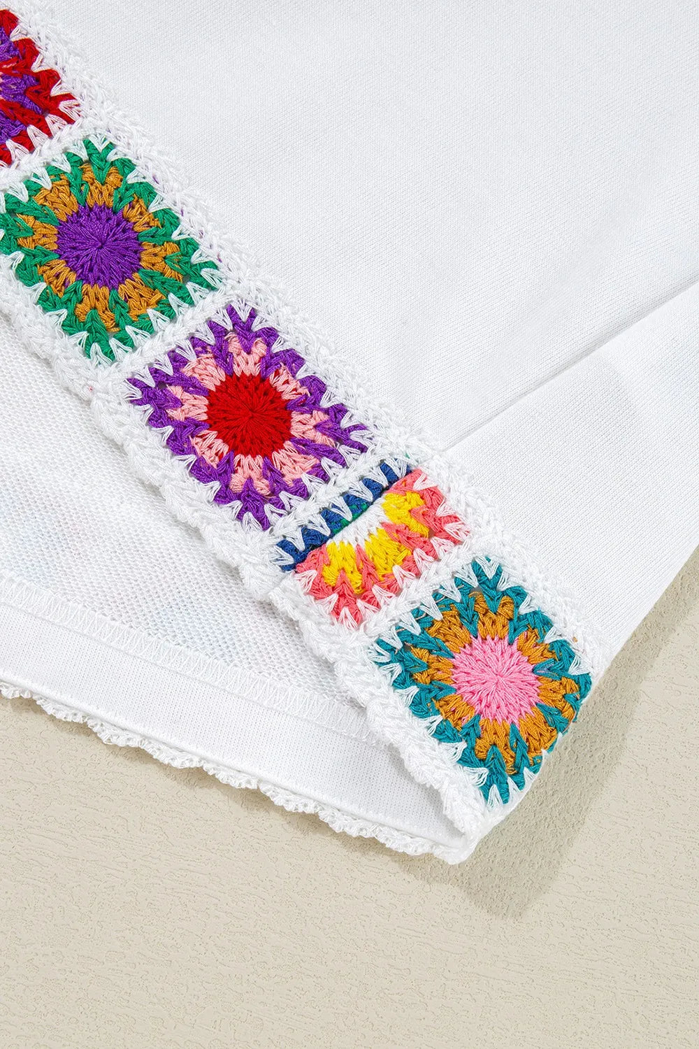 Floral Crochet Patched Ruffled Sleeve Crewneck Blouse.