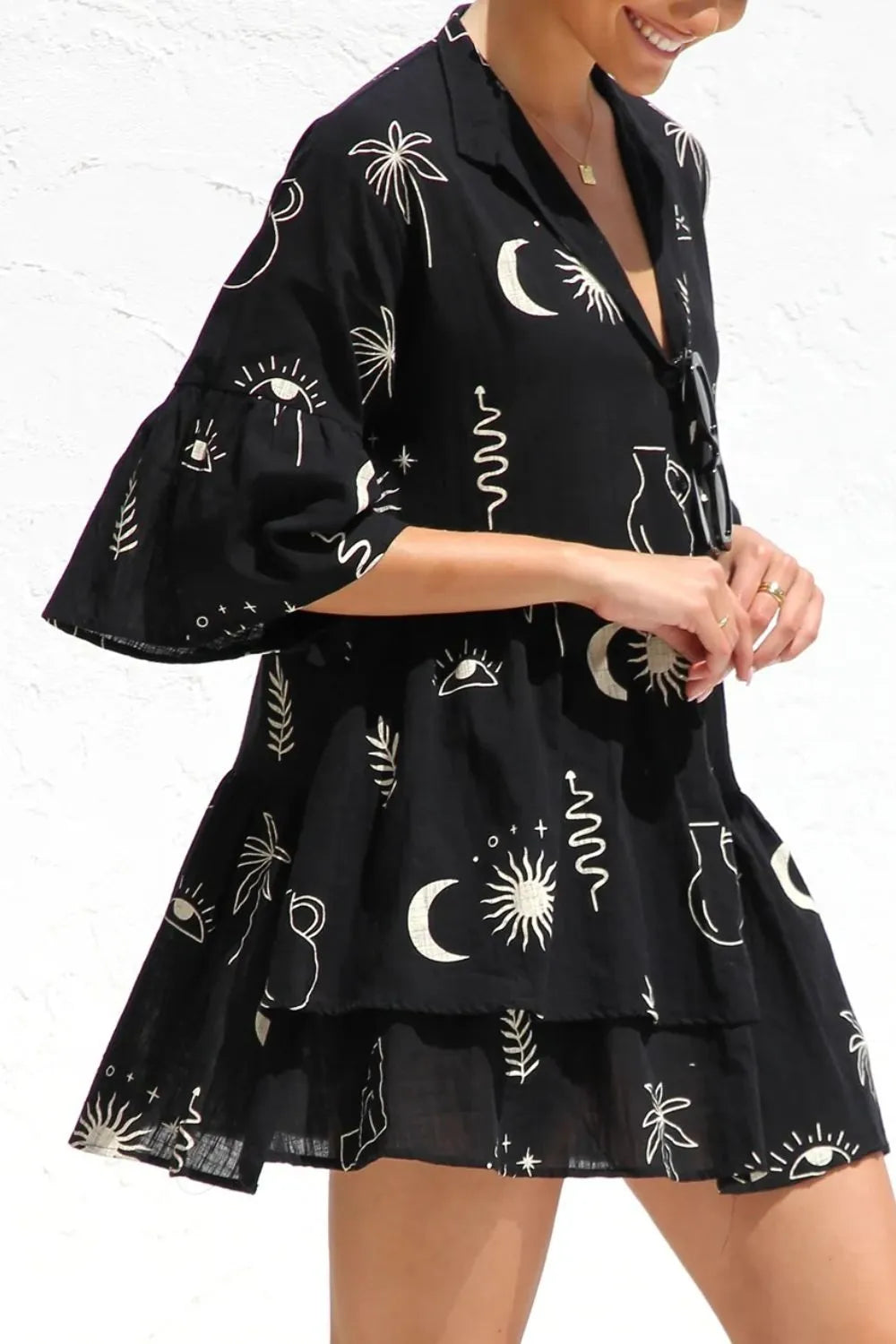 Ruched Printed Three-Quarter Sleeve Mini Dress.