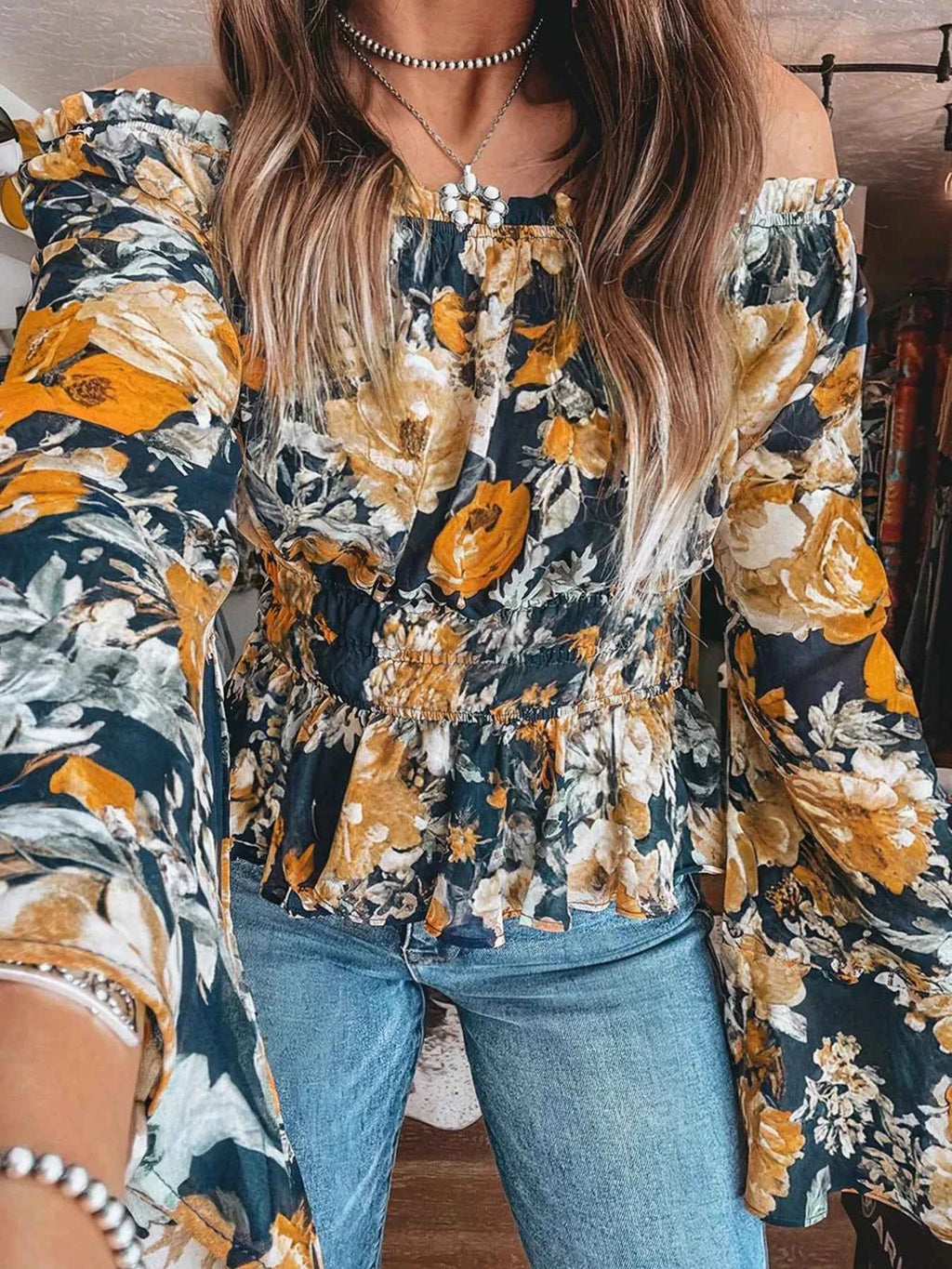 Floral Off Shoulder Bell Sleeve Smocked Peplum Top.