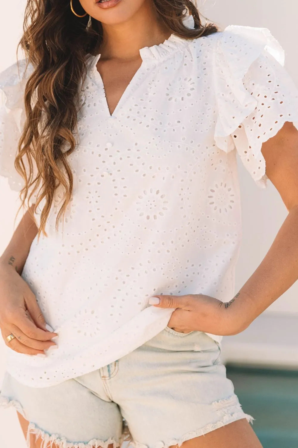 Eyelet Notched Short Sleeve Blouse.