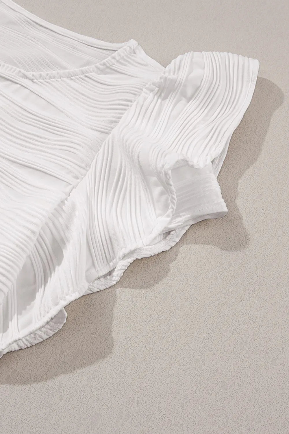 Ruffled Round Neck Textured Top.