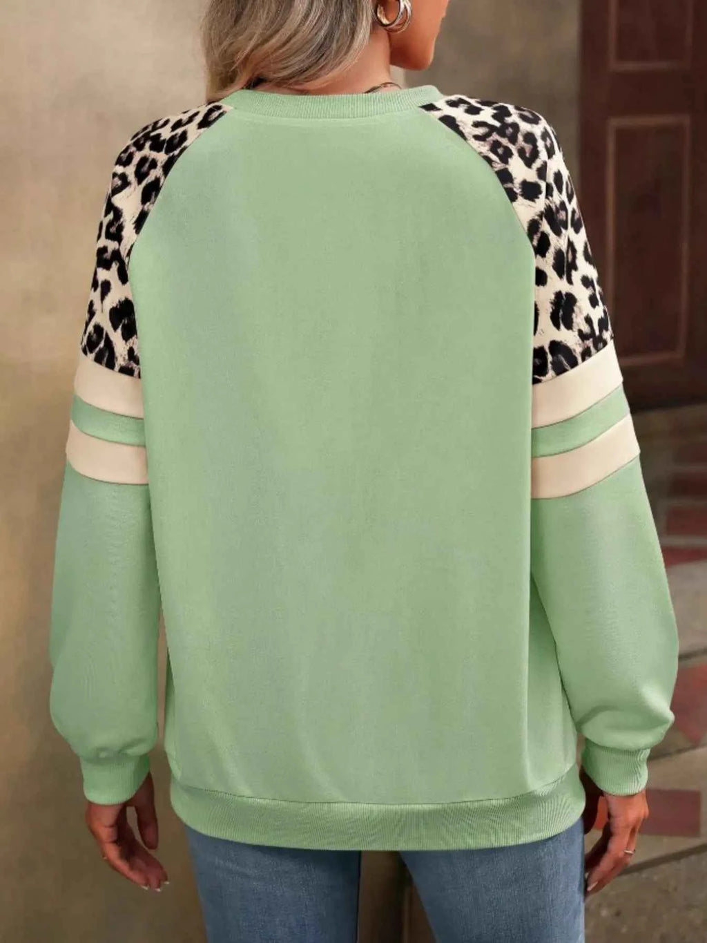 Leopard Round Neck Raglan Sleeve Sweatshirt.