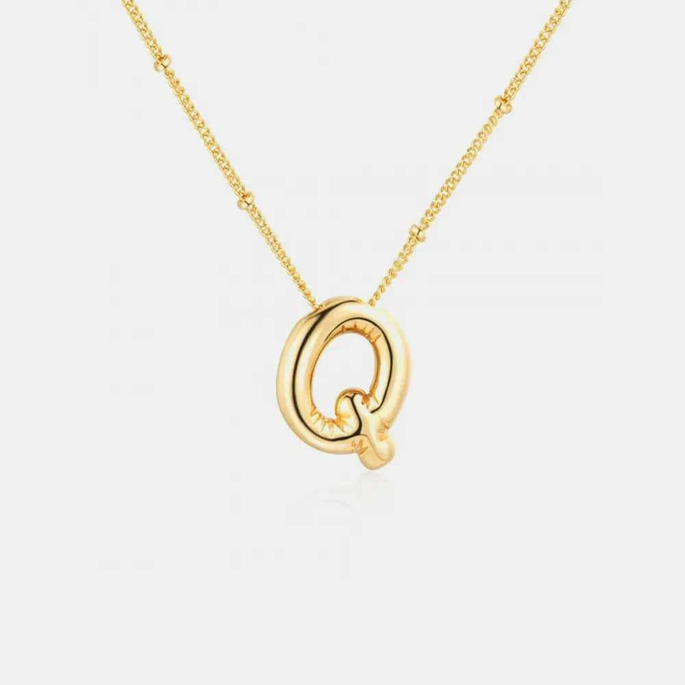 Gold-Plated Bubble Initial Necklace.