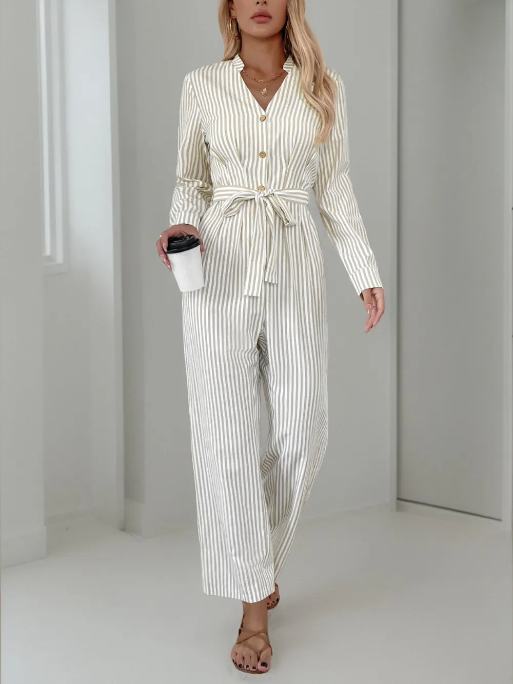 Striped Notched Long Sleeve Tie Waist Jumpsuit.