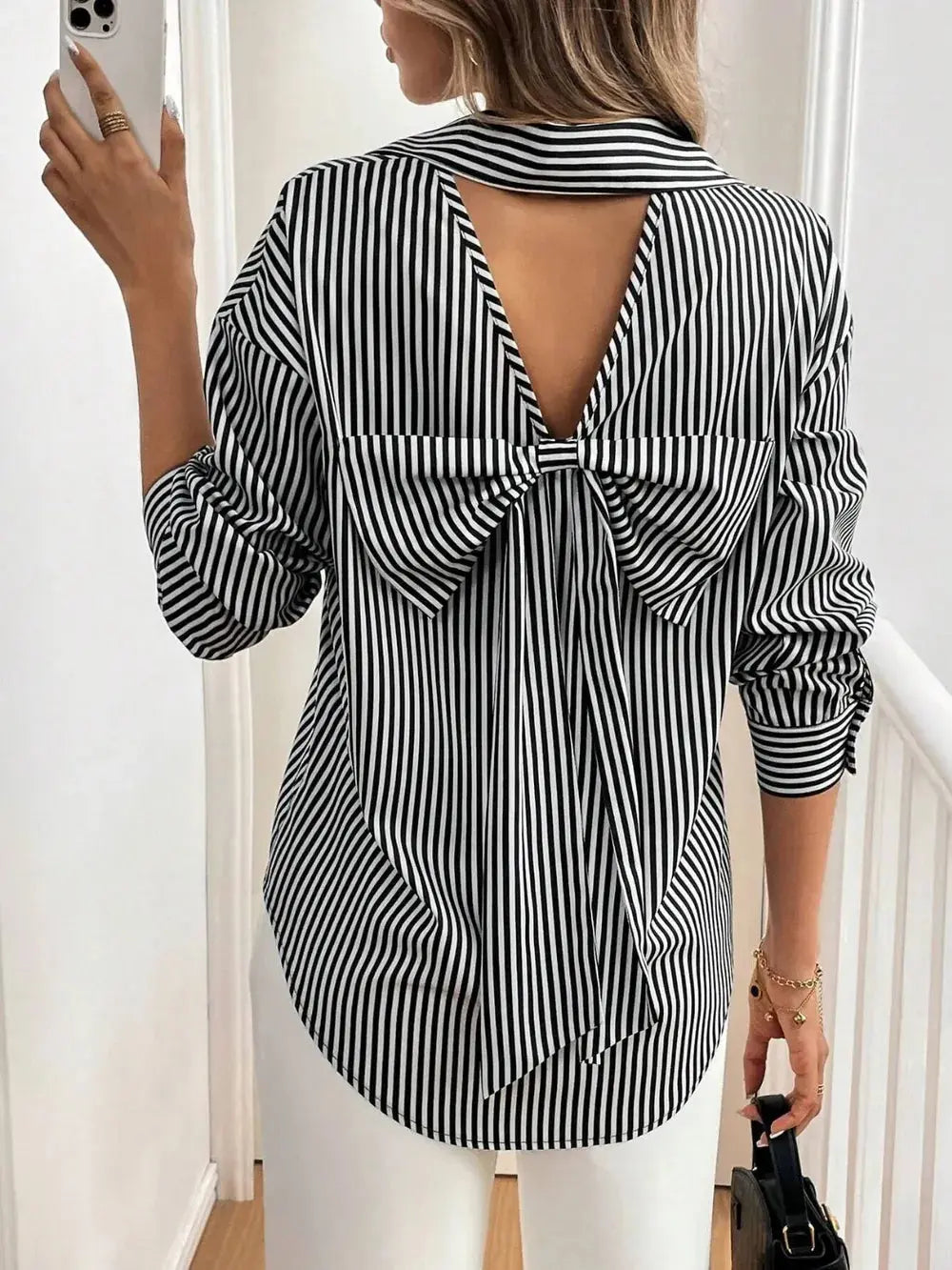 Cutout Bow Back Striped Collared Neck Long Sleeve Shirt.
