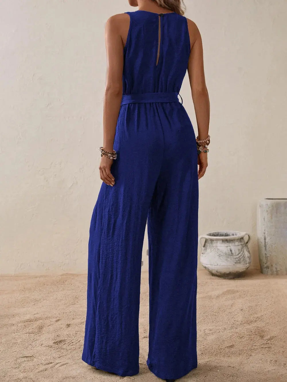 Honey Tied Surplice Sleeveless Wide Leg Jumpsuit.