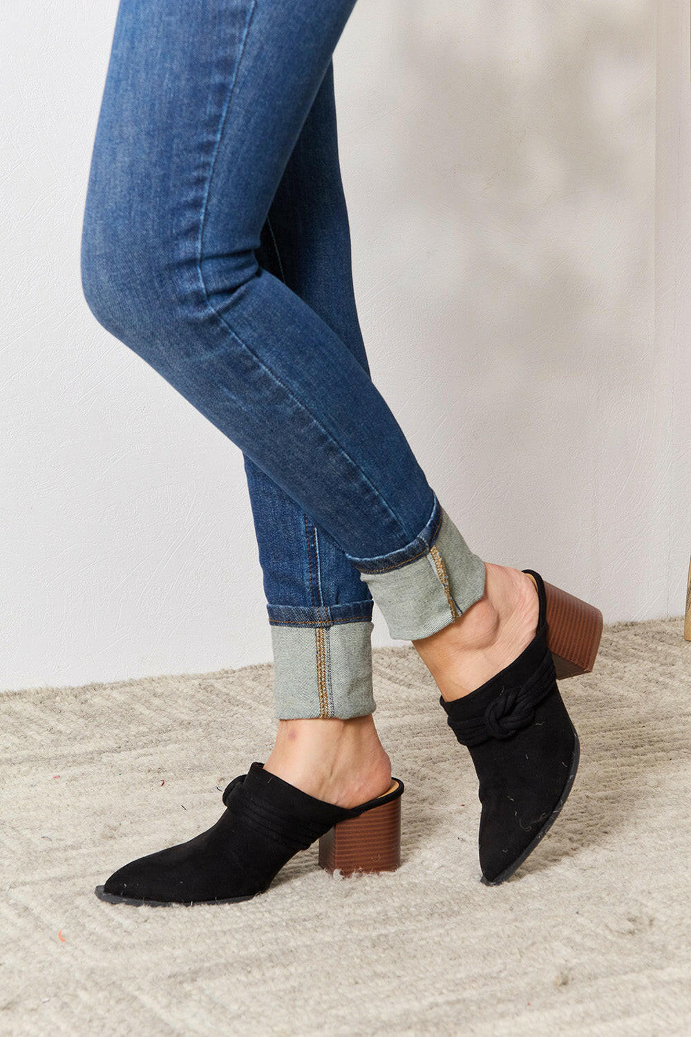 Pointed-Toe Braided Trim Mules.