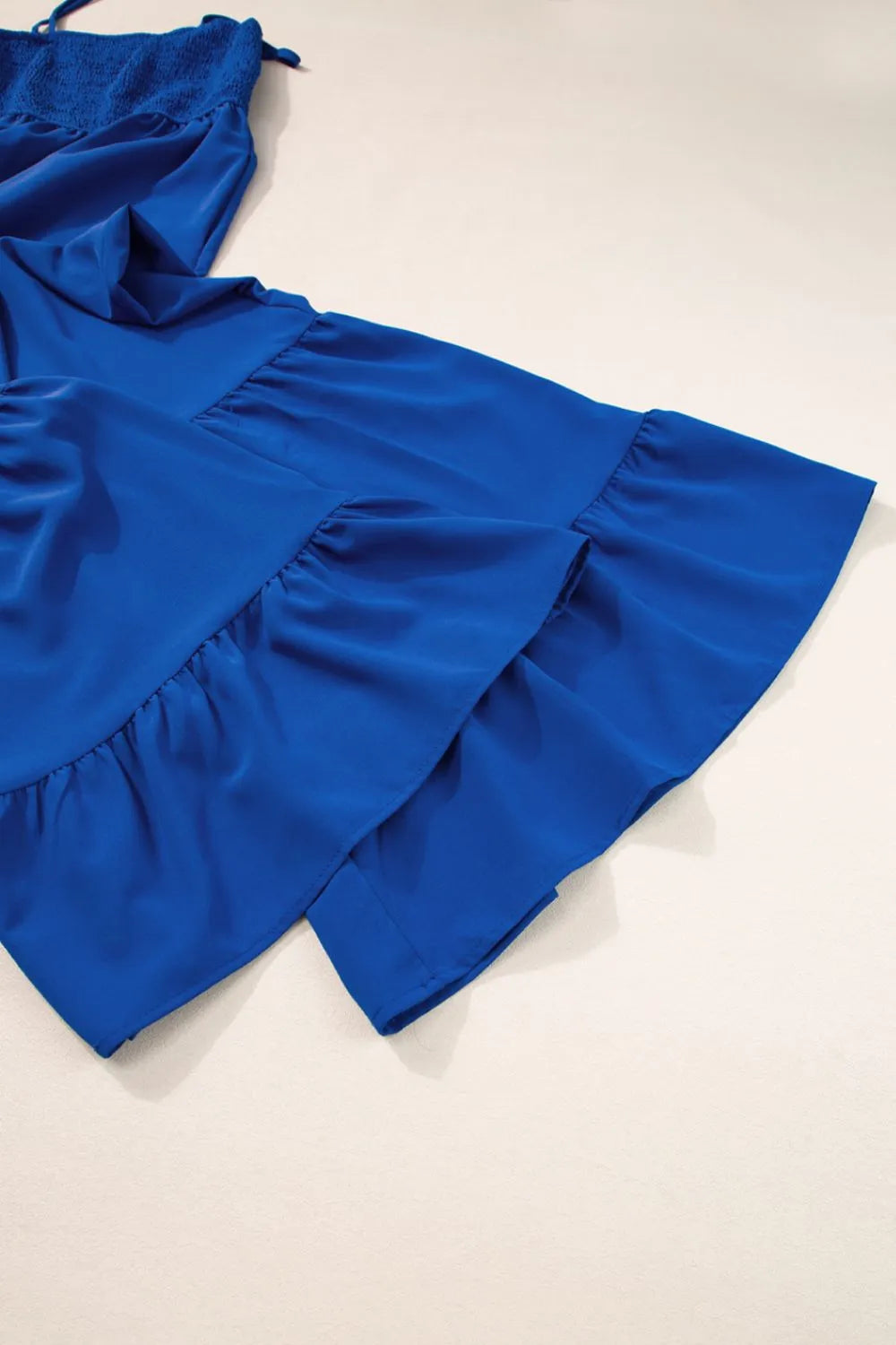 Spaghetti Straps Smocked Ruffled Wide Leg Jumpsuit.