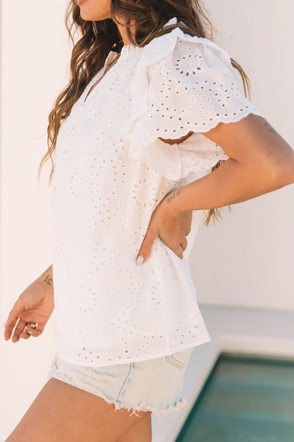 Eyelet Notched Short Sleeve Blouse.