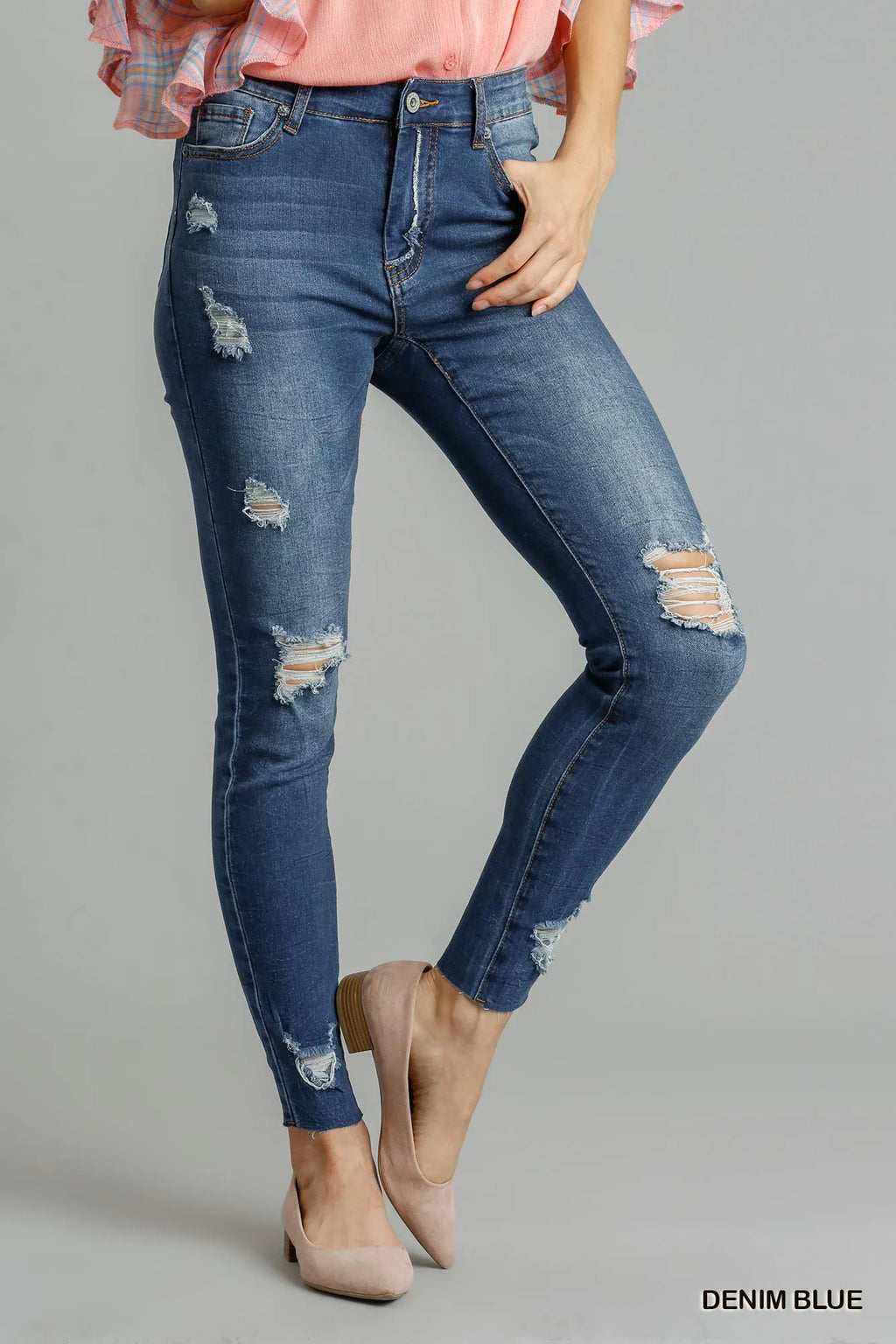 Umgee Distressed Skinny Jeans with Pockets.