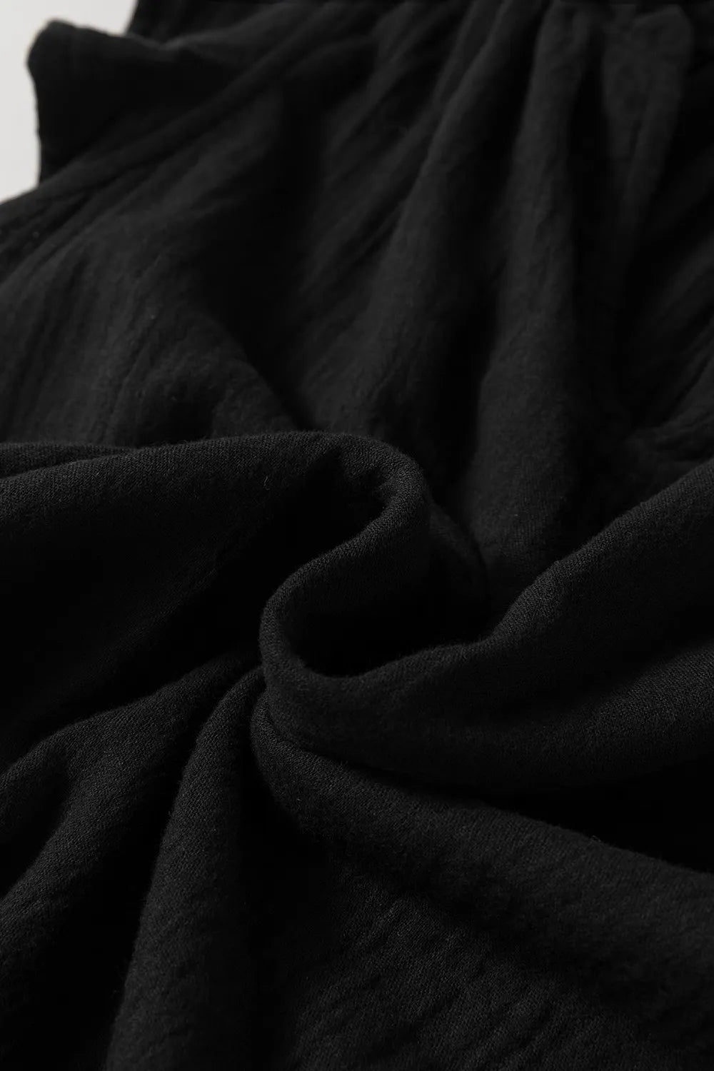 Ruffled Shoulder Notched Shift Tank Top.