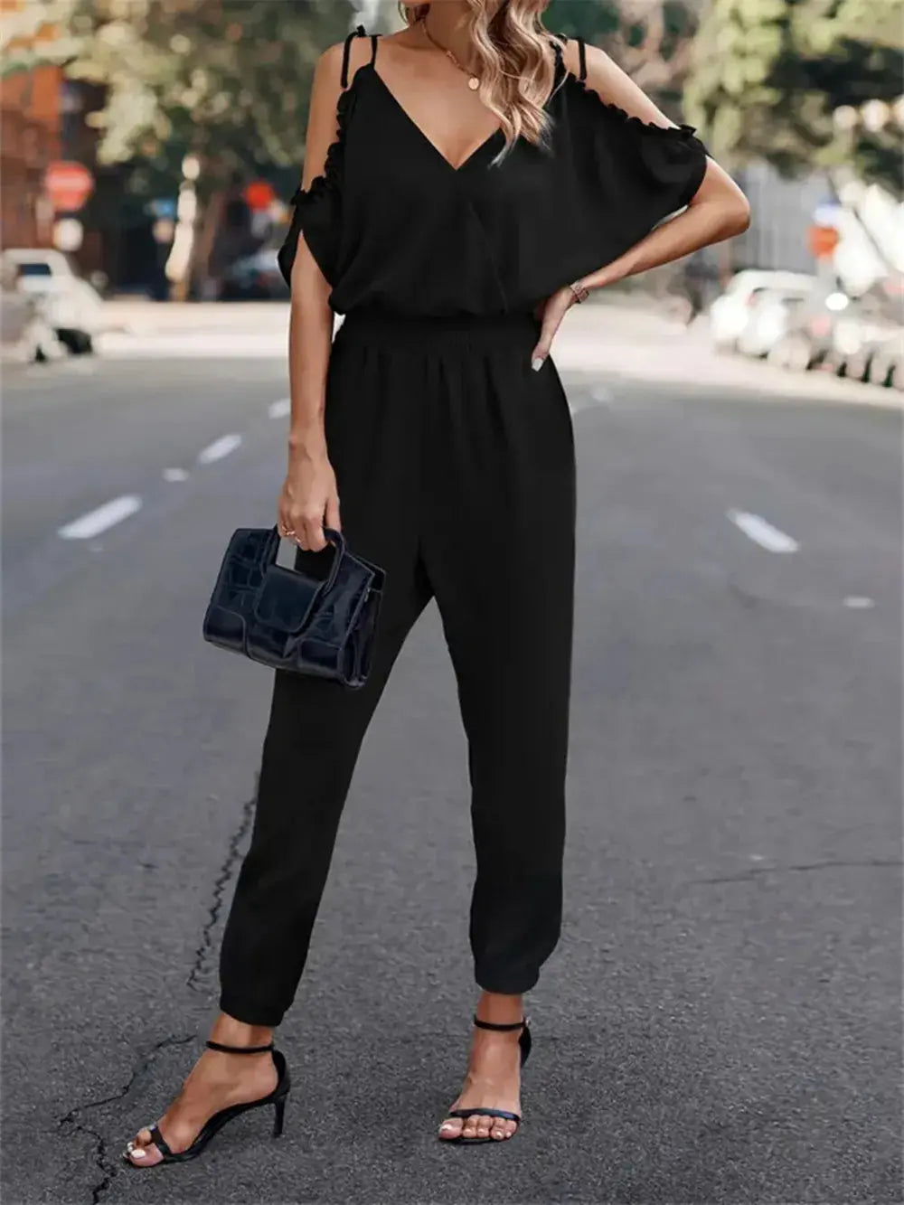 Surplice Tied Spaghetti Strap Jumpsuit.