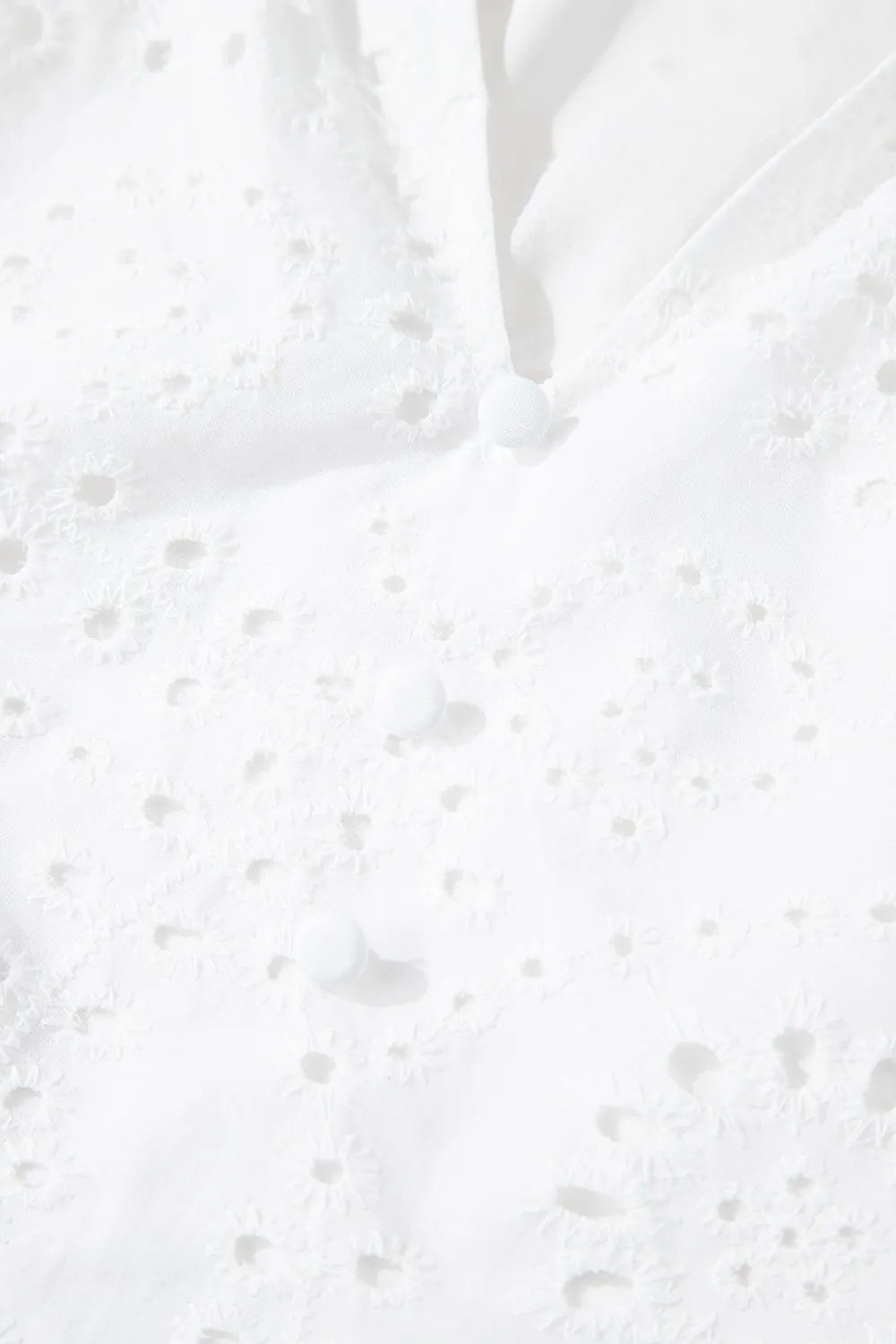 Eyelet Notched Short Sleeve Blouse.