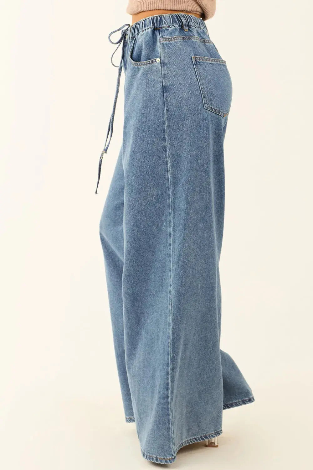 Medium Wash Super Wide Leg Denim Pants.