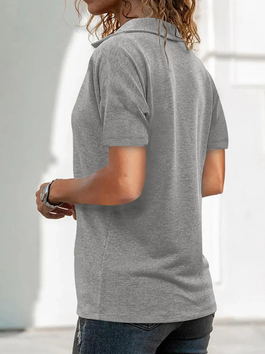 Zip Collar Short Sleeve Top.