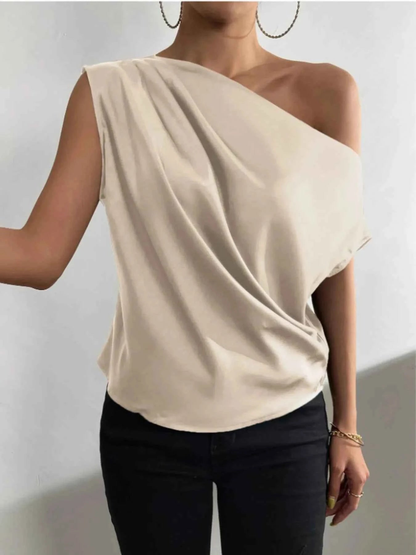 Asymmetrica One-Shoulder Draped Blouse.