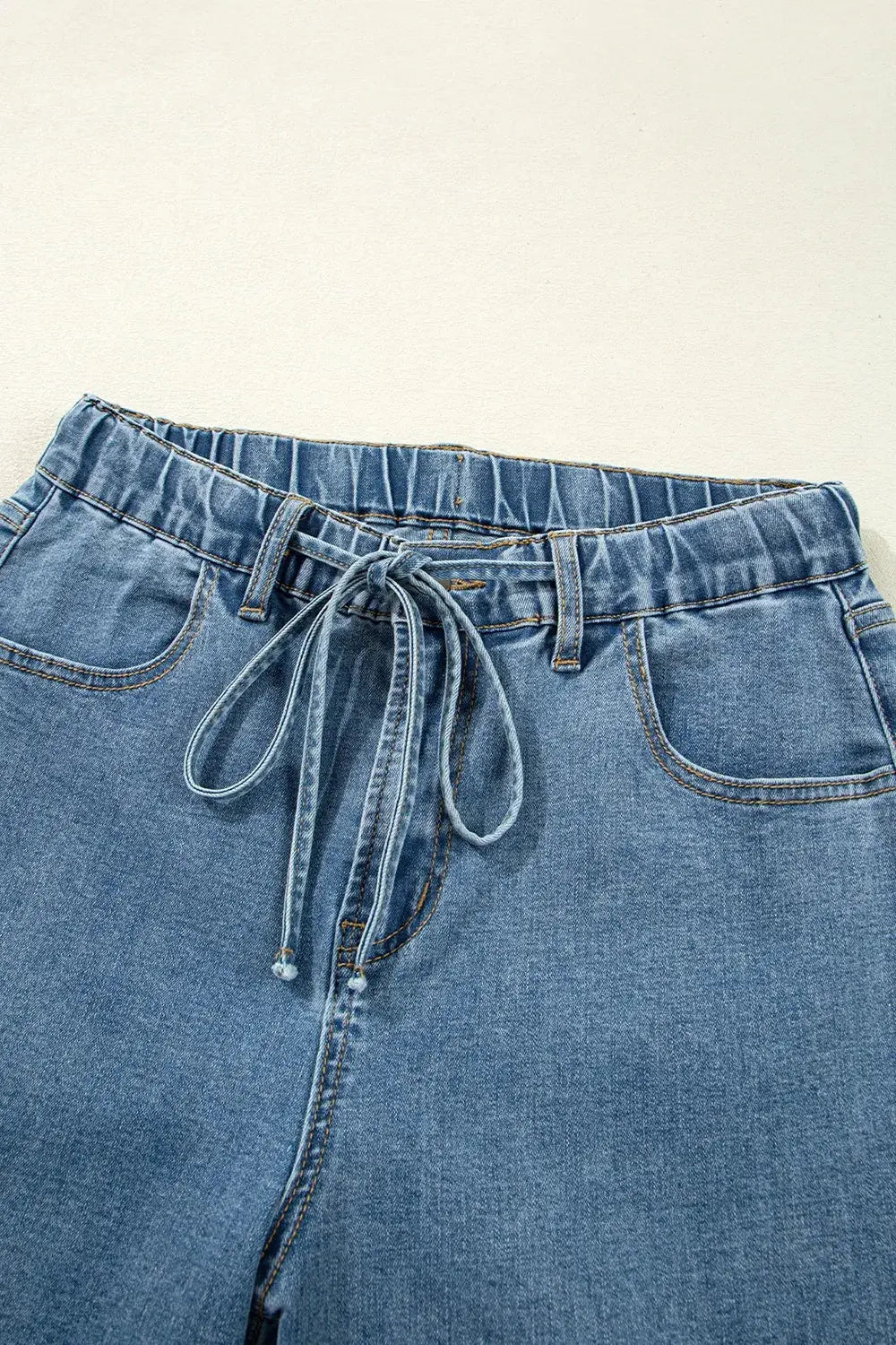 Medium Wash Super Wide Leg Denim Pants.