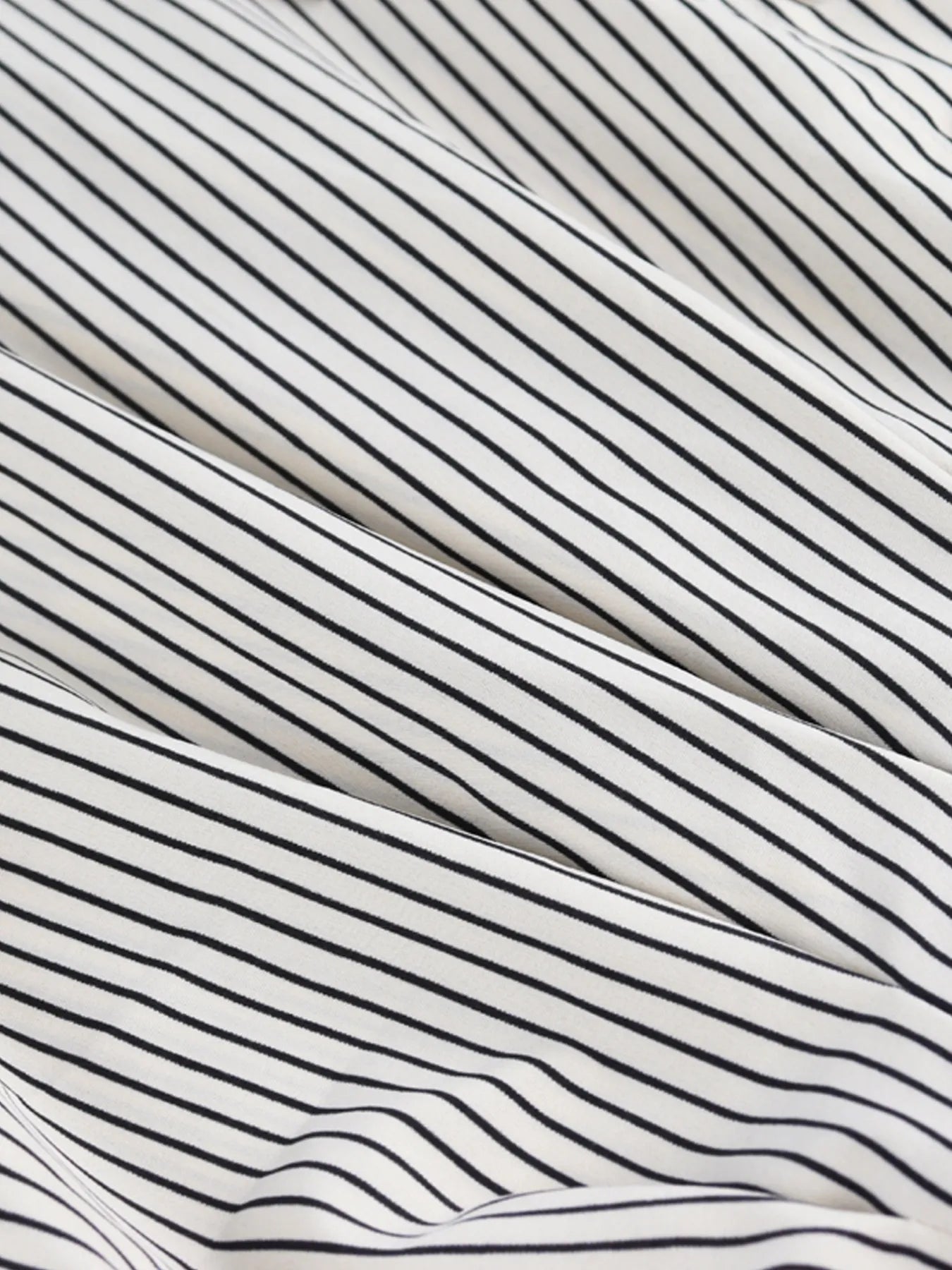 Striped Short Sleeve Button-Up Shirt.