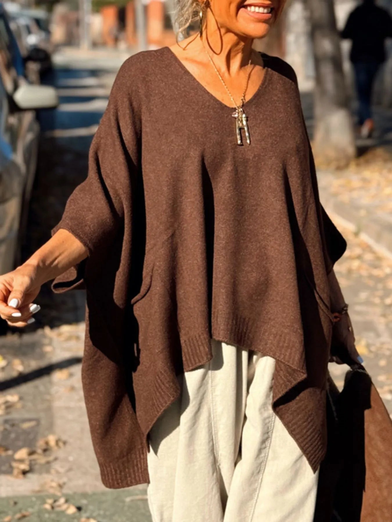 Ribbed Hem V-Neck Sweater.