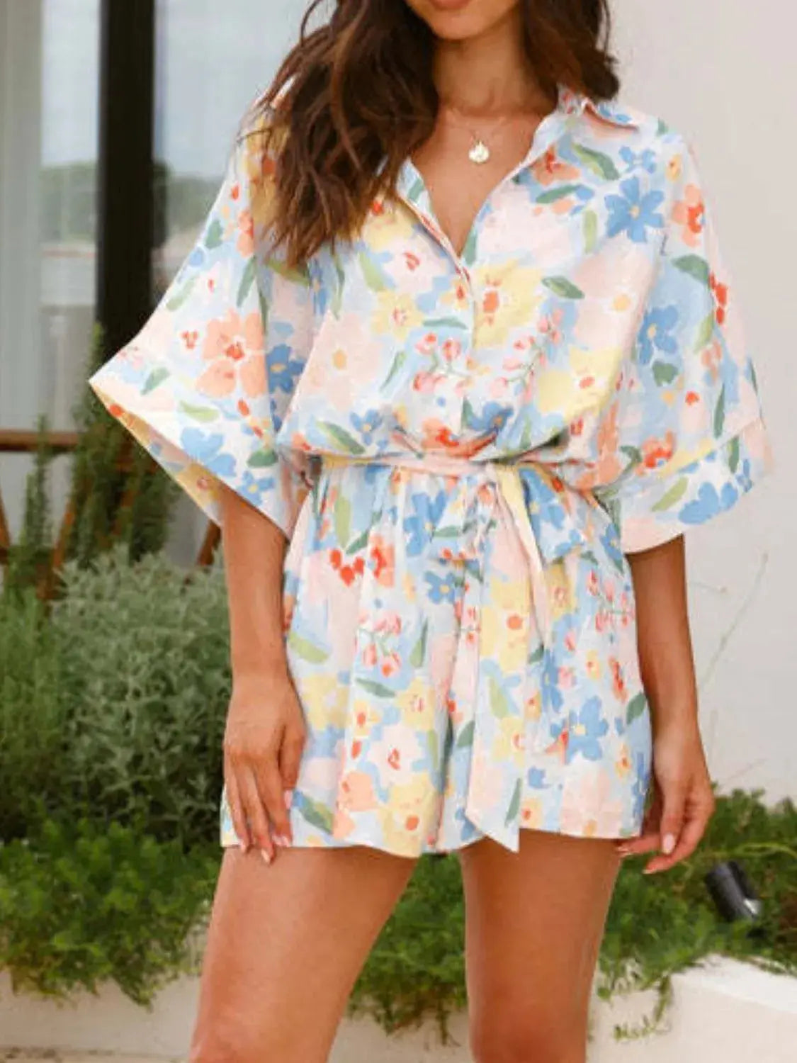 Printed Half Sleeve Tie Waist Romper.