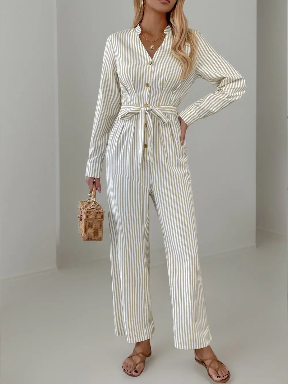 Striped Notched Long Sleeve Tie Waist Jumpsuit.