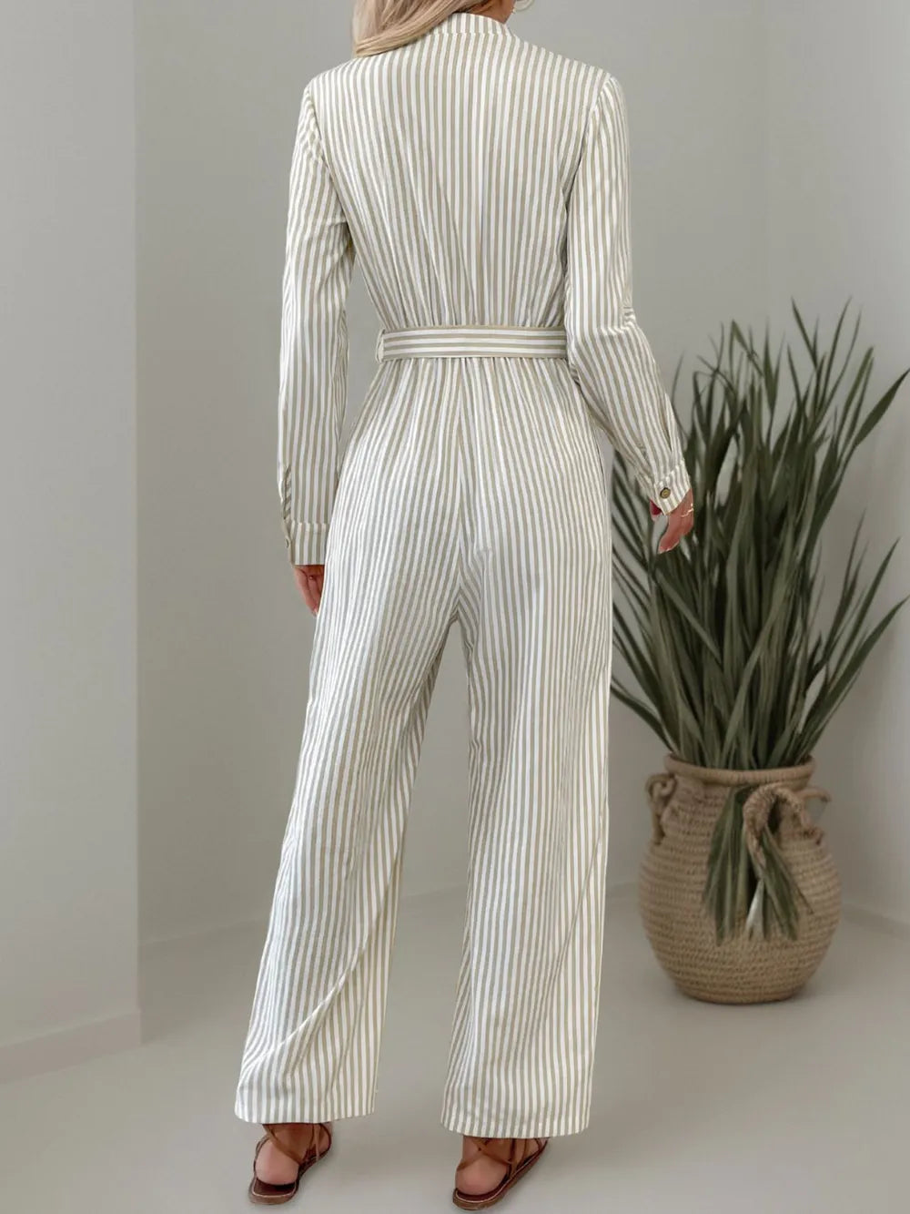 Striped Notched Long Sleeve Tie Waist Jumpsuit.