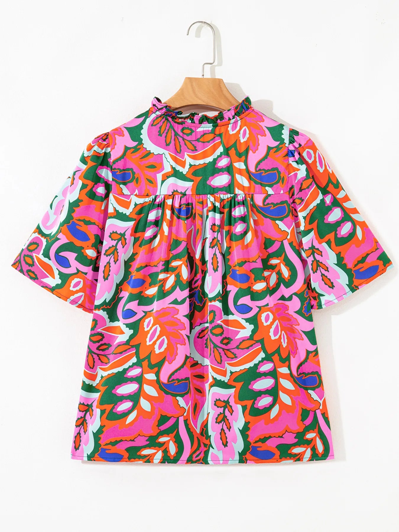 Tropical Print Short Sleeve Tie Neck Blouse.