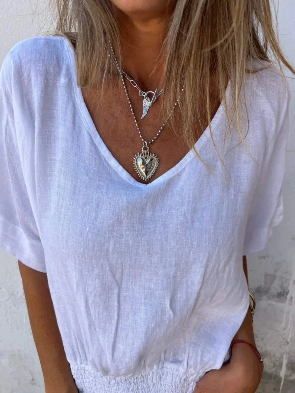 Full Size Smocked Hem V-Neck Relaxed Fit T-Shirt Plus Size.