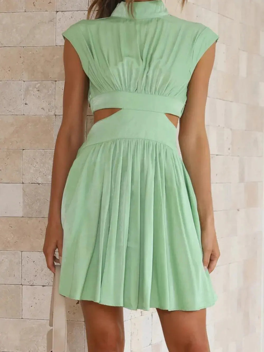 Cutout Ruched Mock Neck Mini Dress.