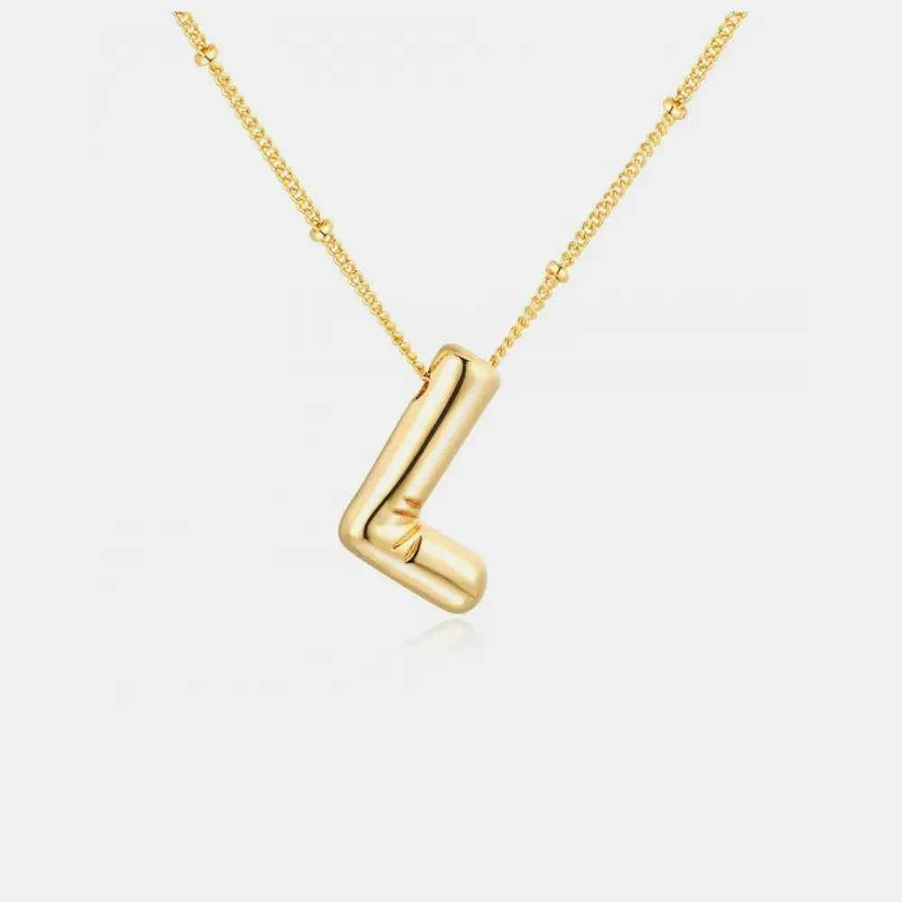 Gold-Plated Bubble Initial Necklace.
