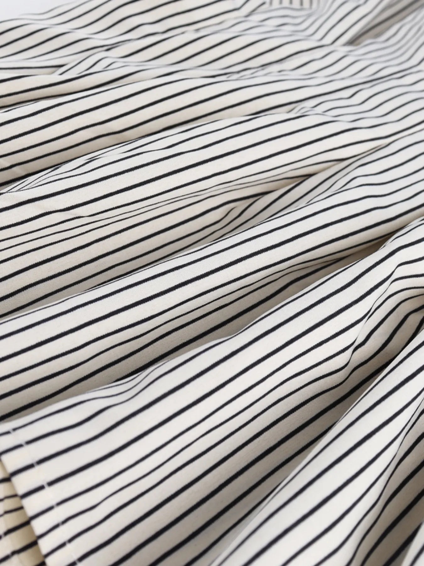 Striped Short Sleeve Button-Up Shirt.