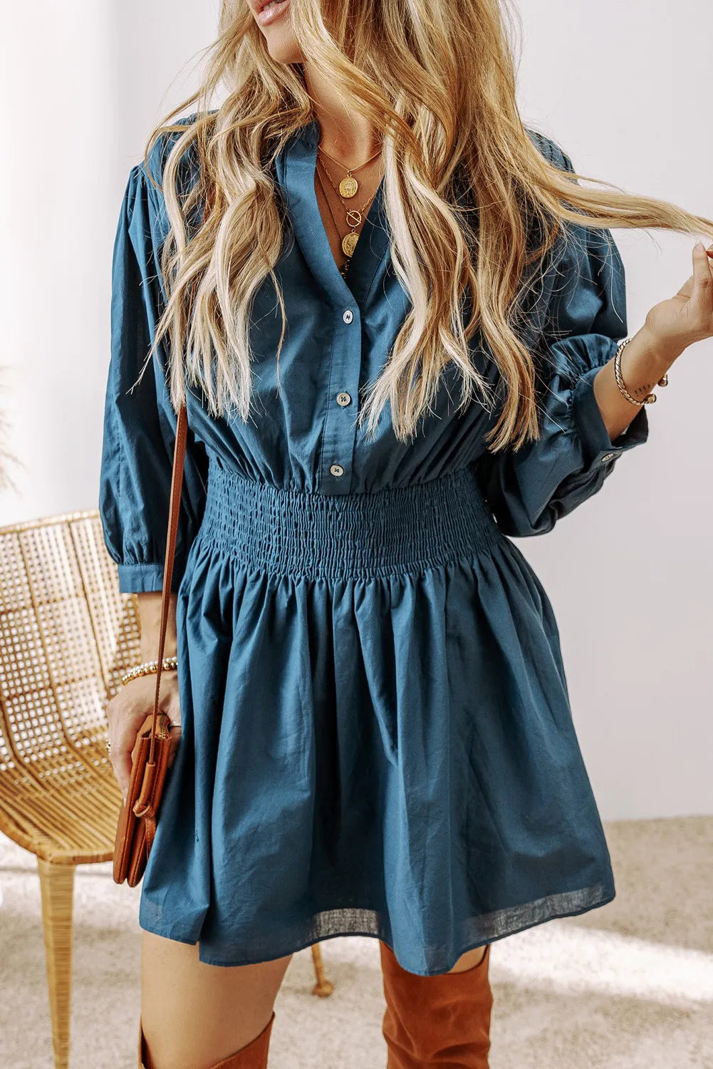 Smocked Half Button Three-Quarter Sleeve Mini Dress.