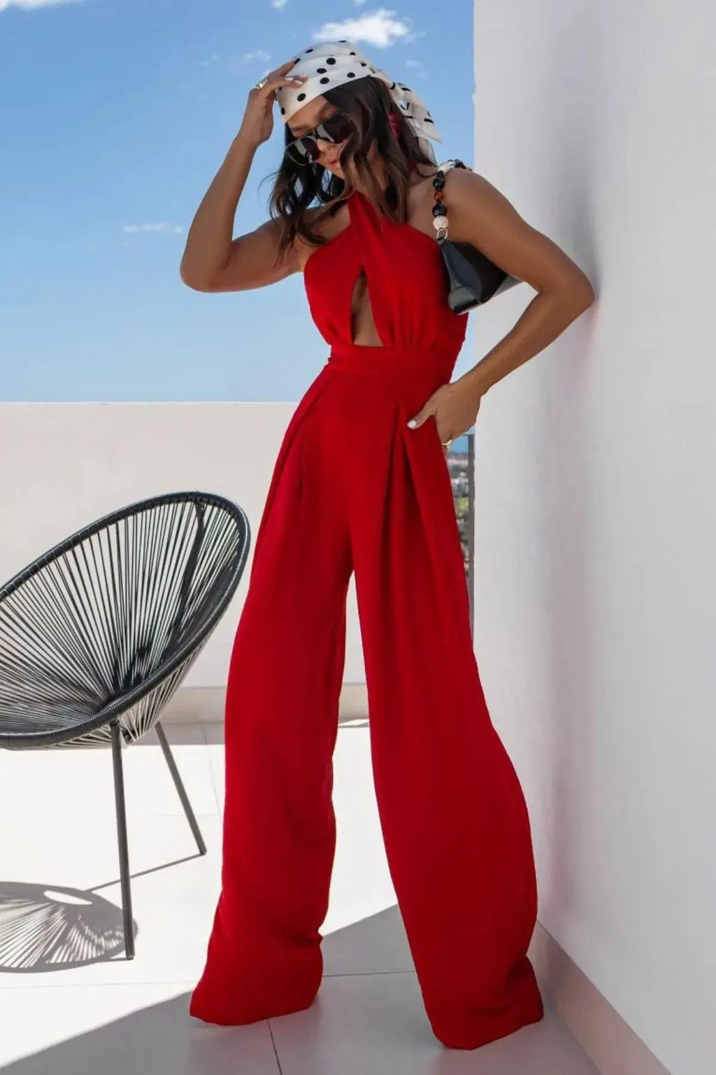 Halter Neck Wide Leg Jumpsuit with Keyhole Detail.