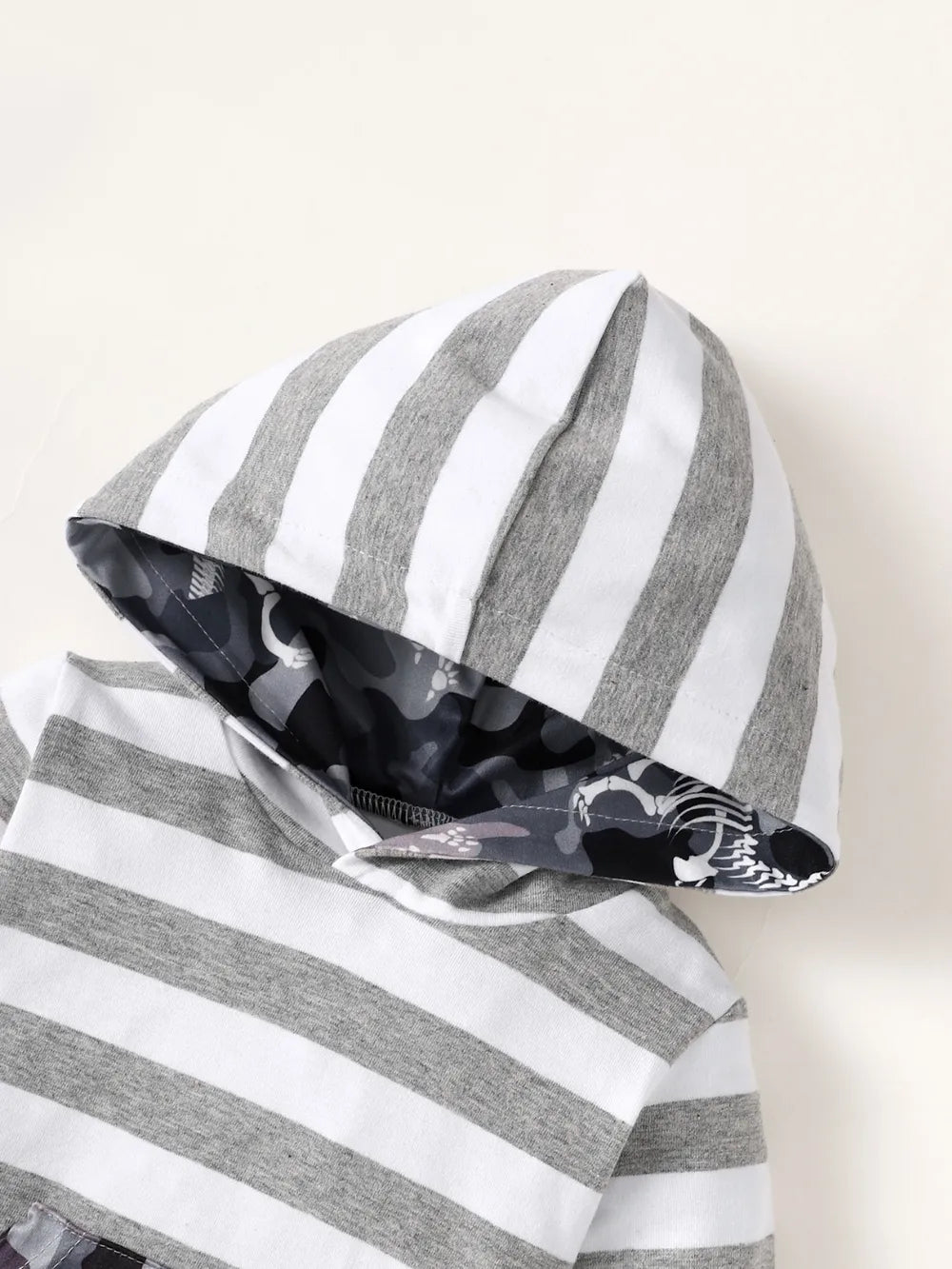 Children's Striped Hooded Bodysuit and Camouflage Pants Set.